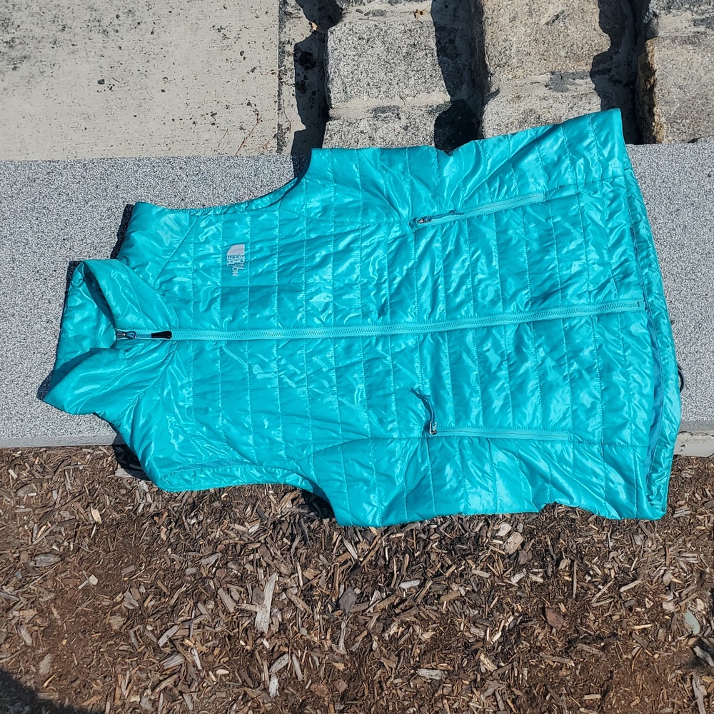 The North Face Turquoise Puffer Vest